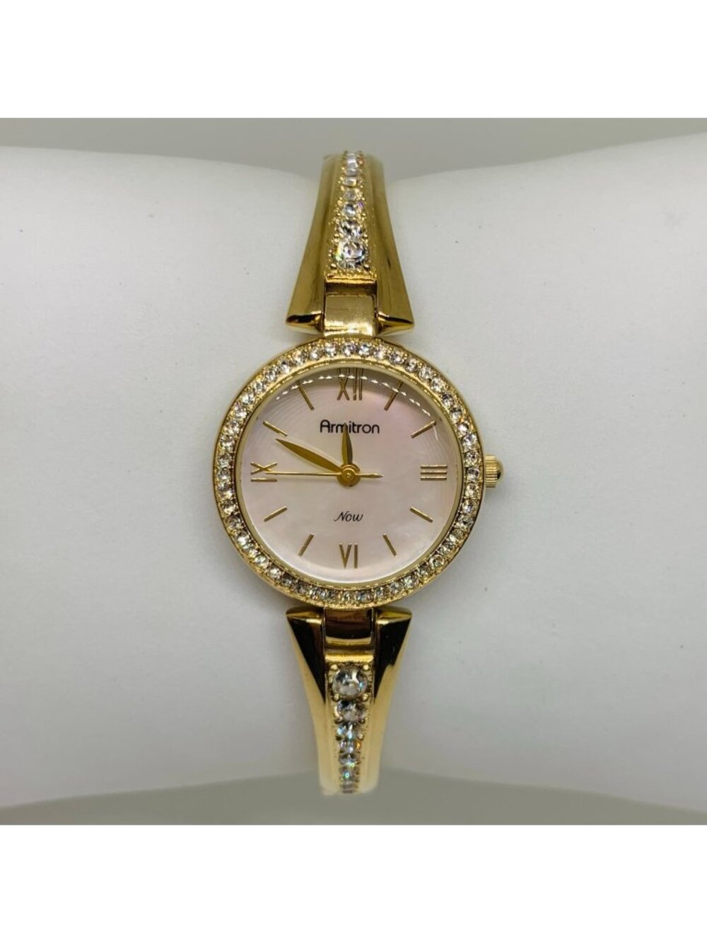 Armitron women’s watch gold tone 24mm mop dial quartz rhinestones running